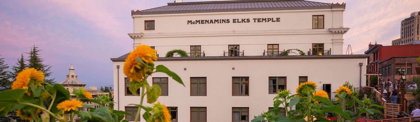 McMenamins Elks Temple lit up at dusk